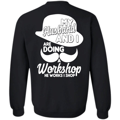 A black t-shirt with the shopify logo