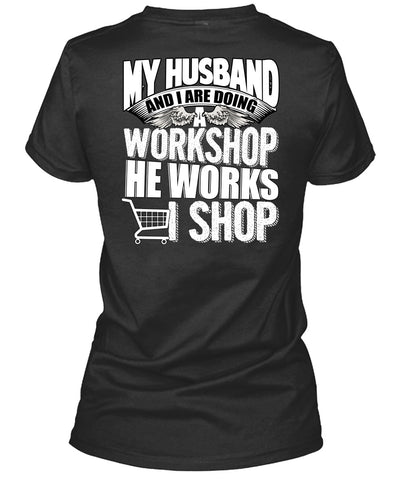 A black t-shirt with the shopify logo