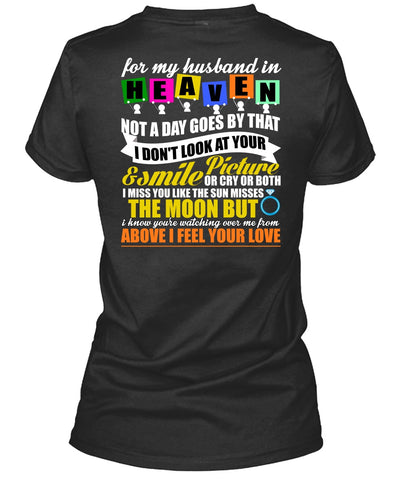 A black t-shirt with the shopify logo