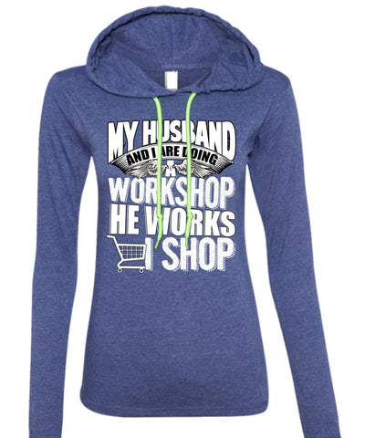 A black t-shirt with the shopify logo