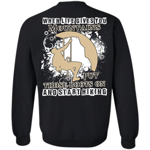 A black t-shirt with the shopify logo