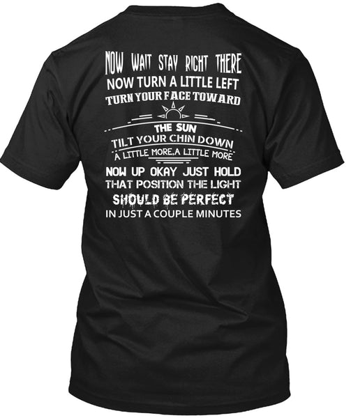 A black t-shirt with the shopify logo