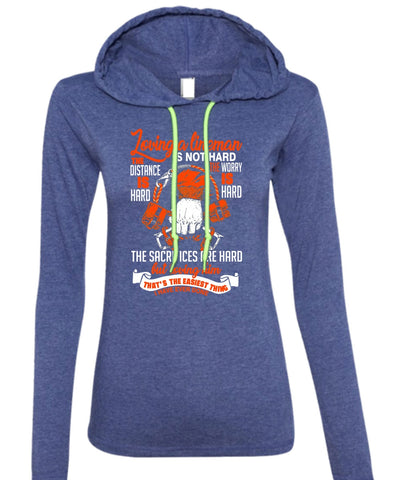 A black t-shirt with the shopify logo