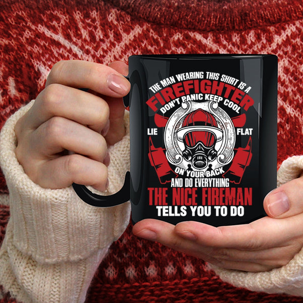 The Man Wearing This Shirt Is A Firefighter Coffee Mug, Nice Fireman Coffee Cup