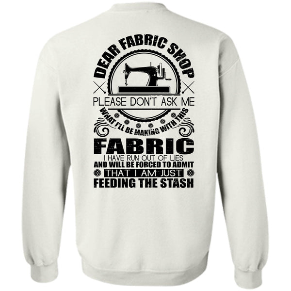 A black t-shirt with the shopify logo