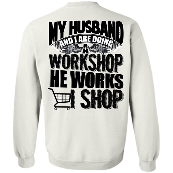 A black t-shirt with the shopify logo