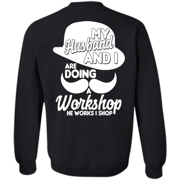 A black t-shirt with the shopify logo