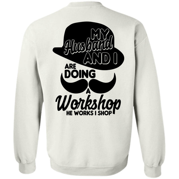 A black t-shirt with the shopify logo