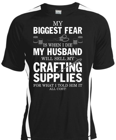 A black t-shirt with the shopify logo