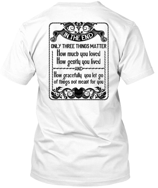 A black t-shirt with the shopify logo