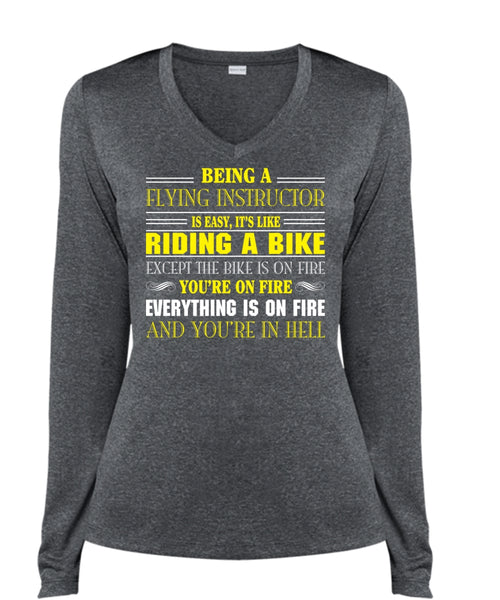 Being A Flying Instructor Is Easy T Shirt, It's Like Riding A Bike Except The Bike Is On Fire T Shirt (Ladies LS Heather V-Neck)