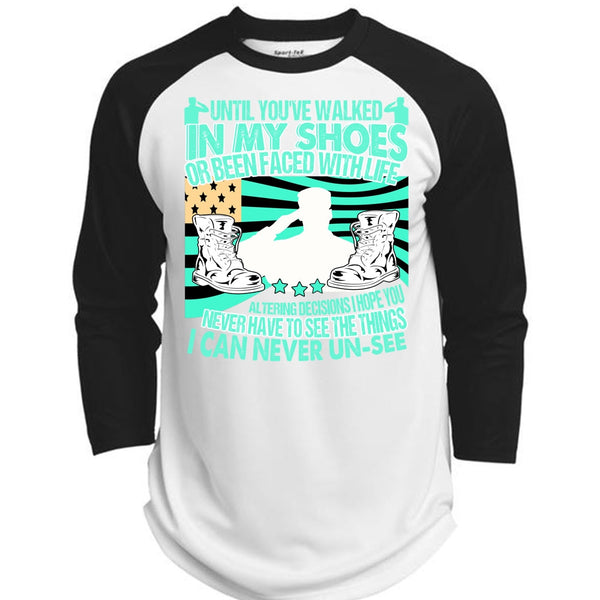 A black t-shirt with the shopify logo