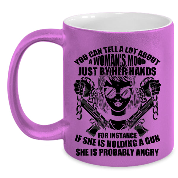 She Is Holding A Gun Coffee Mug, You Can Tell A Lot About A Woman's Mood Accent Mug
