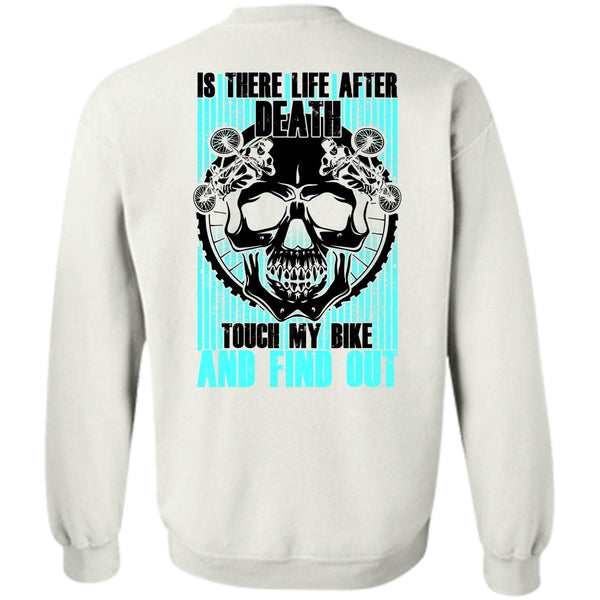 A black t-shirt with the shopify logo