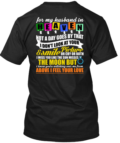 A black t-shirt with the shopify logo