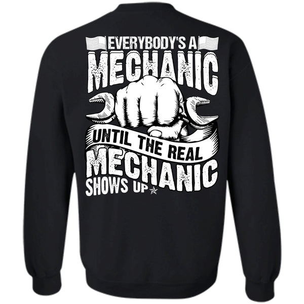 A black t-shirt with the shopify logo