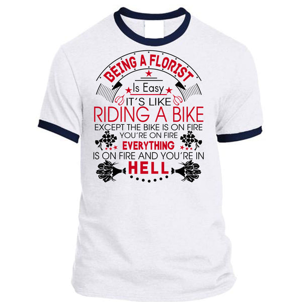 A black t-shirt with the shopify logo