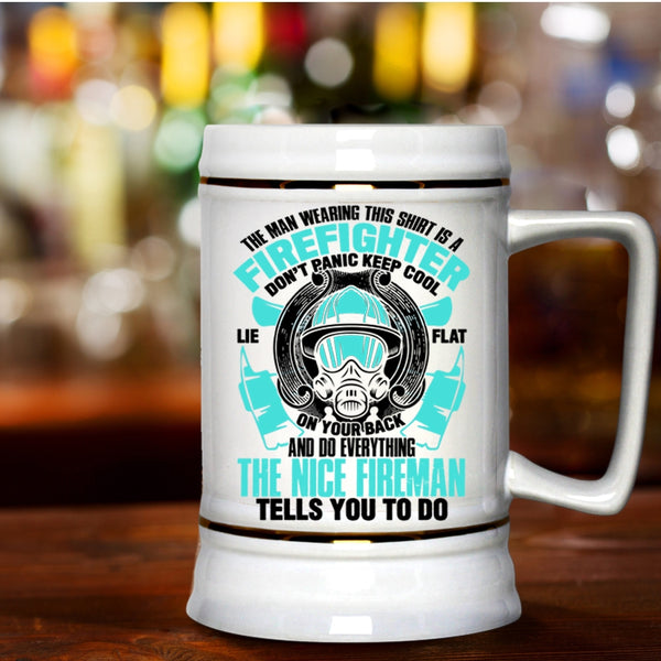 Nice Fireman Beer Stein 22oz, The Man Wearing This Shirt Is A Firefighter Beer Mug