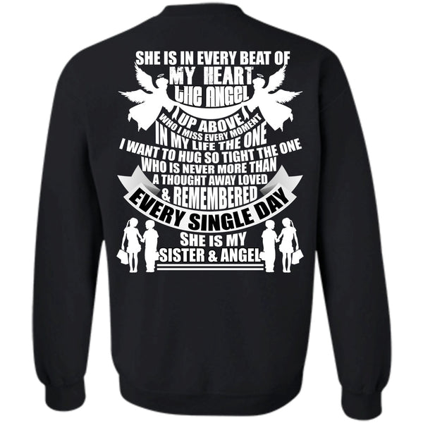 A black t-shirt with the shopify logo