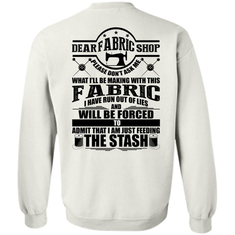 A black t-shirt with the shopify logo