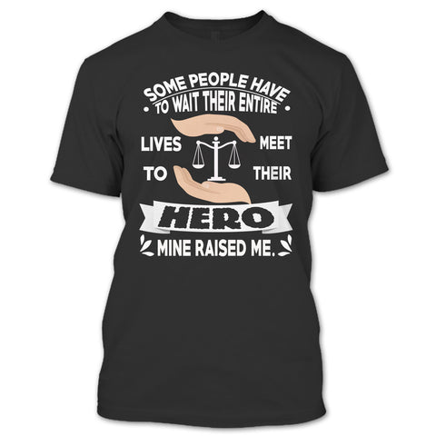 A black t-shirt with the shopify logo
