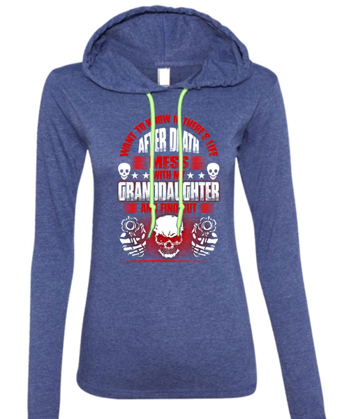 A black t-shirt with the shopify logo