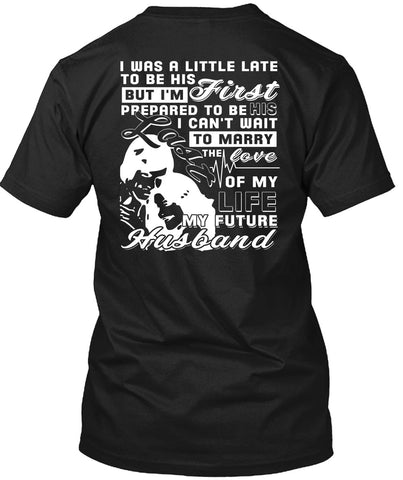 A black t-shirt with the shopify logo