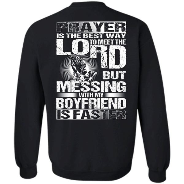 A black t-shirt with the shopify logo