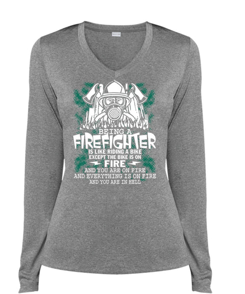 Being A Firefighter T Shirt, Riding A Bike T Shirt, Cool Shirt (Ladies LS Heather V-Neck)