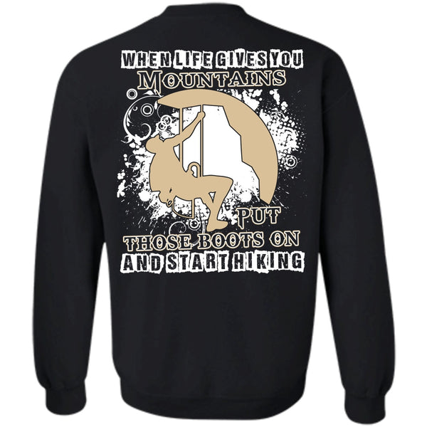 A black t-shirt with the shopify logo