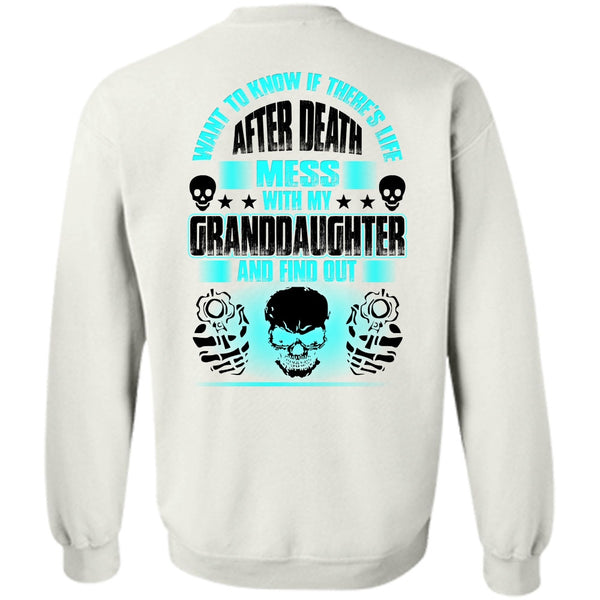 A black t-shirt with the shopify logo