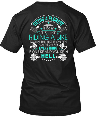 A black t-shirt with the shopify logo